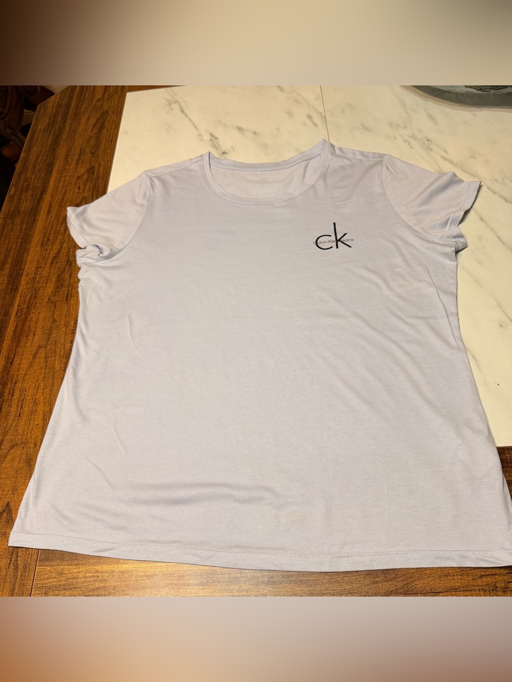 Calvin Klein Light Blue Crewneck Short Sleeve Tee with CK Logo